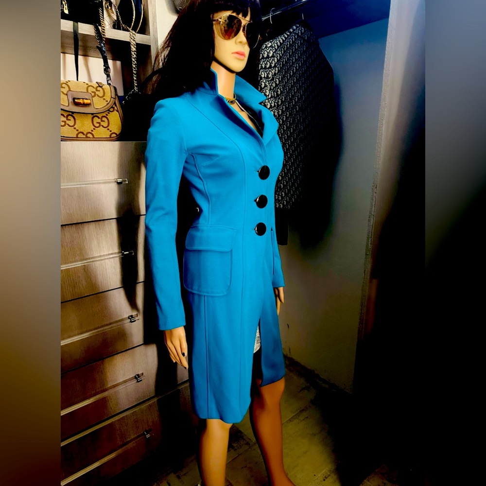 Beautiful rare bright turquoise XS  cost, light stretch!